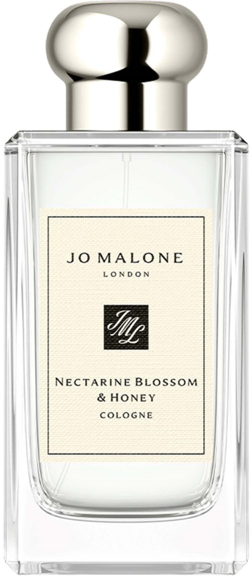 Läpinäkyvä lasipullo hopeisella korkilla, merkinnällä Jo Malone, Nectarine Blossom & Honey Cologne.