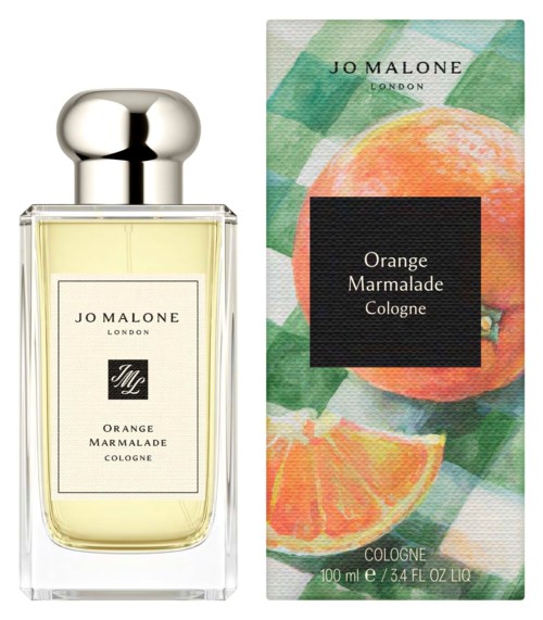 En parfyllåda och förpackning för Jo Malone Orange Marmalade Cologne med ljusa apelsin- och gröna fruktillustrationer.