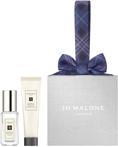 Jo Malone London gift set with a perfume bottle, a cream, and a box with a plaid ribbon handle.