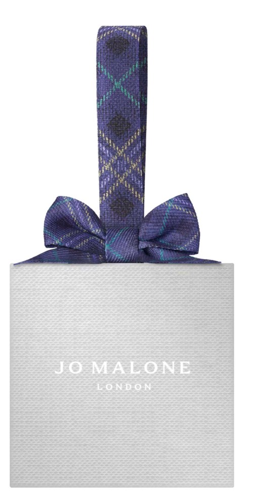 Jo Malone London perfume box with a purple plaid ribbon bow on top.