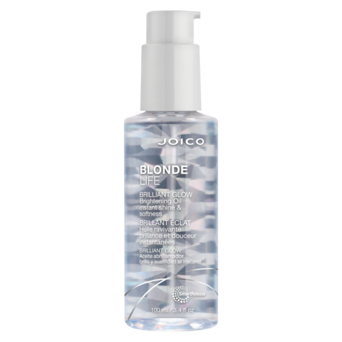 Een doorzichtige fles met pomp bevat Joico Blonde Life Brightening Oil voor glanzend, zacht blond haar.