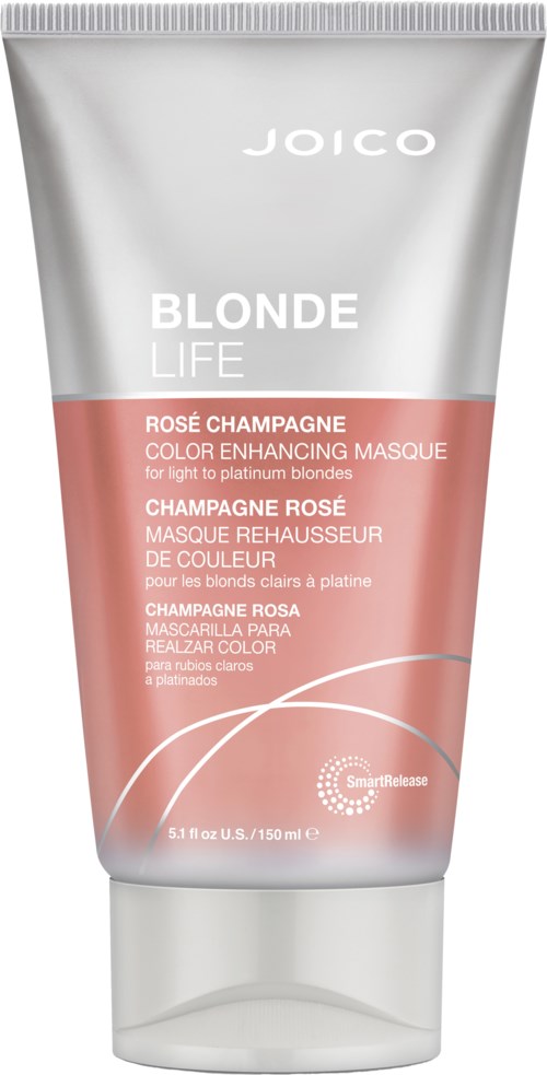 Een cosmetische tube met label Joico Blonde Life in roze en zilver, noemt champagne masker voor lichte blondines.
