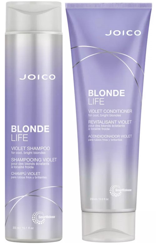 Violetinväriset shampoot ja hoitoaineet violetissa pulloissa, joissa on valkoinen teksti ja muotoilu.