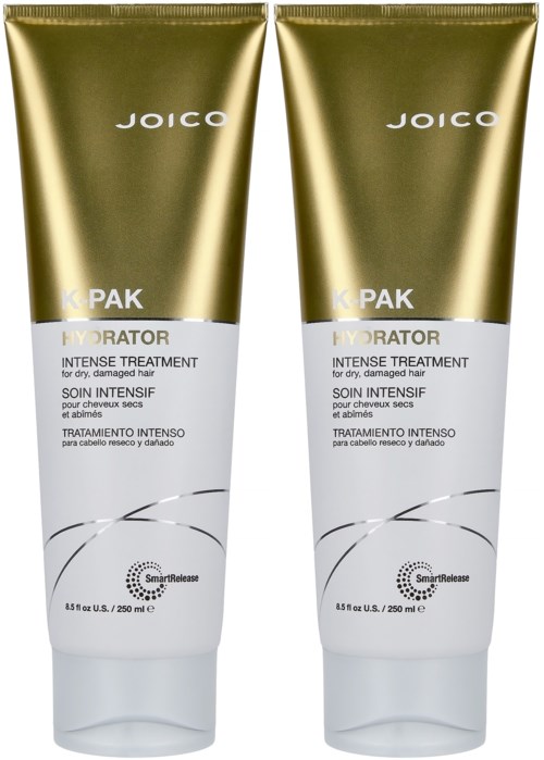 Twee tubes van Joico K-Pak Intense Treatment voor beschadigd haar. Gouden en witte verpakking met productinformatie.