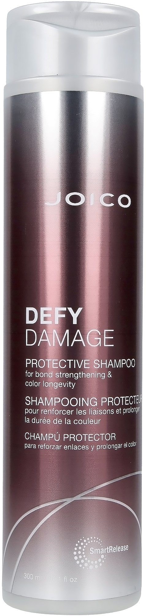 Ein langer, zylindrischer Shampoo-Flasche mit Silberkappe, beschriftet mit 'Joico' und 'Defy Damage Protect'.