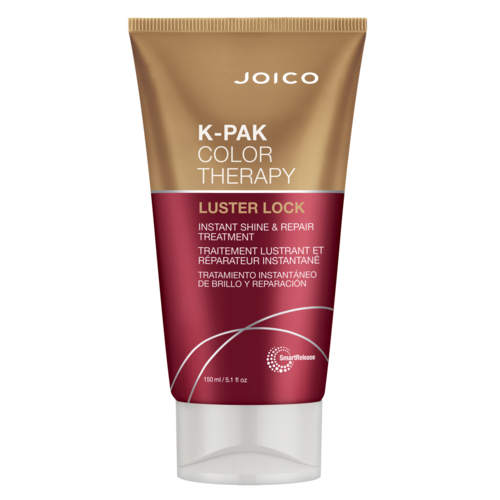 Een tube van Joico K-Pak Color Therapy Luster Lock haarbehandeling, goud en bordeauxrood, met productgegevens op de voorkant.
