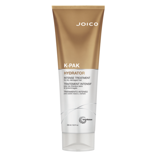 Een tube van JOICO K-PAK Hydrator haarbehandeling voor beschadigd of droog haar. Wit en goud kleuren, met productgegevens op etiket.
