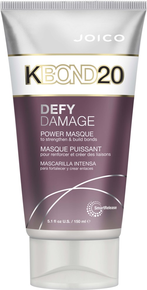 Een tube Joico K-Pak K-Bond 20 haarmasker met paarse en witte verpakking, bedoeld om haarbeschadiging te versterken en herstellen.