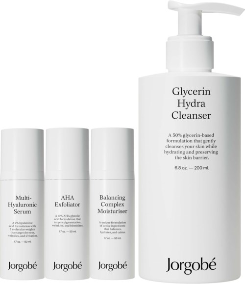 Drie verzorgingsflesjes en een grote fles met Glycerin Hydra Cleanser voor het gezicht. De grote fles heeft een pomp.