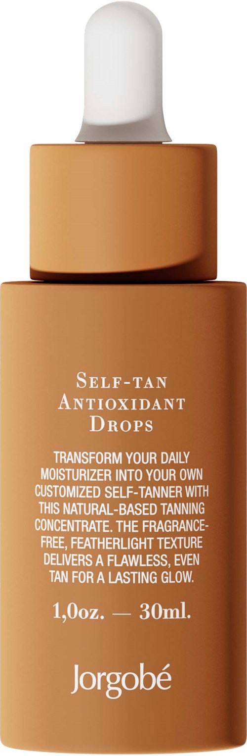 Ett brunt flaska med vit dropper, märkt "Self-tan Antioxidant Drops" för solbränna och återfuktning.