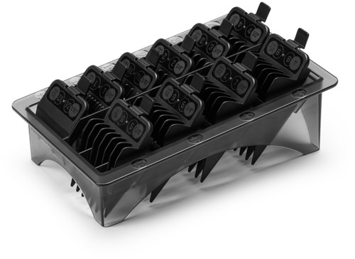 A tray holds multiple black clinic or lab testing devices with screens and buttons, arranged in rows.