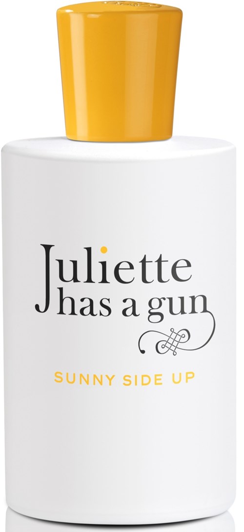 Een witte fles met een gele dop, met tekst over Juliette en een zonnige dag.