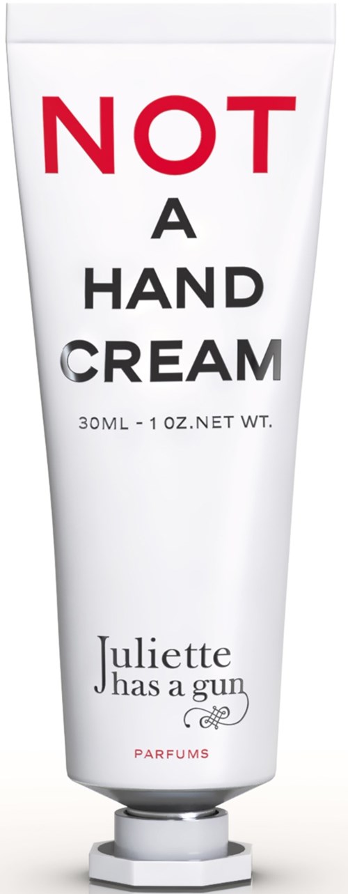 Een witte tube met de tekst "NOT A HAND CREAM" en kleinere tekst en een merknaam, Juliette has a gun.