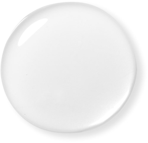 Een ronde, doorzichtige schaal of glas met een glanzend oppervlak en zachte reflectie.