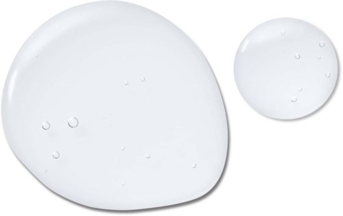 Twee heldere, ronde gel-achtige blobs in verschillende maten met kleine bellen erin op een witte achtergrond.