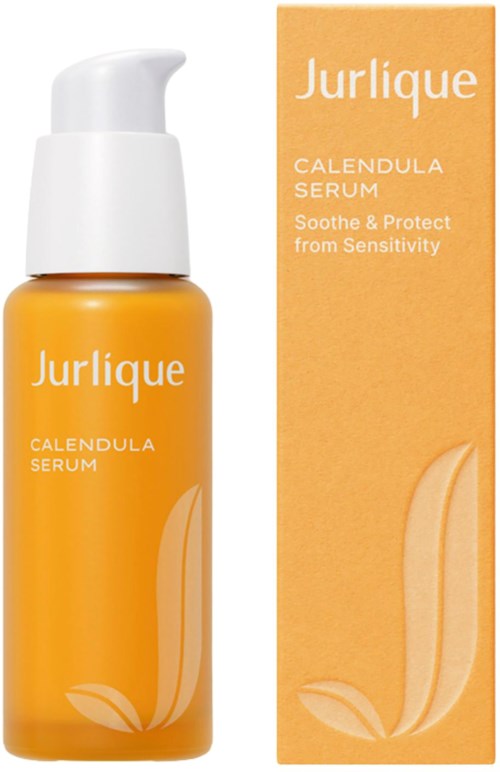 A yellow bottle with a white pump and its matching orange box, labeled Jurlique Calendula Serum for sensitive skin.