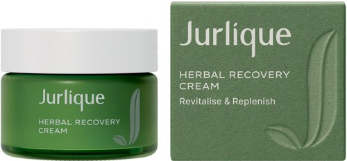 A green jar labeled Jurlique Herbal Recovery Cream next to a matching box. The packaging is simple and natural-looking.