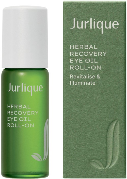 Eine grüne Flasche mit Jurlique Herbal Recovery Eye Oil Roll-On und passender grüner Verpackung mit Produktinformationen.
