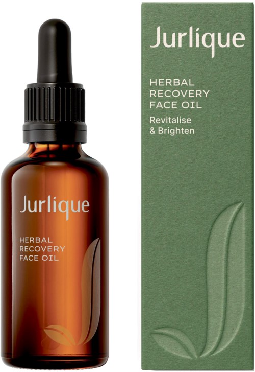 Bruine fles met pipet naast groene verpakking, gelabeld Jurlique Herbal Recovery Face Oil, Revitalise & Brighten.