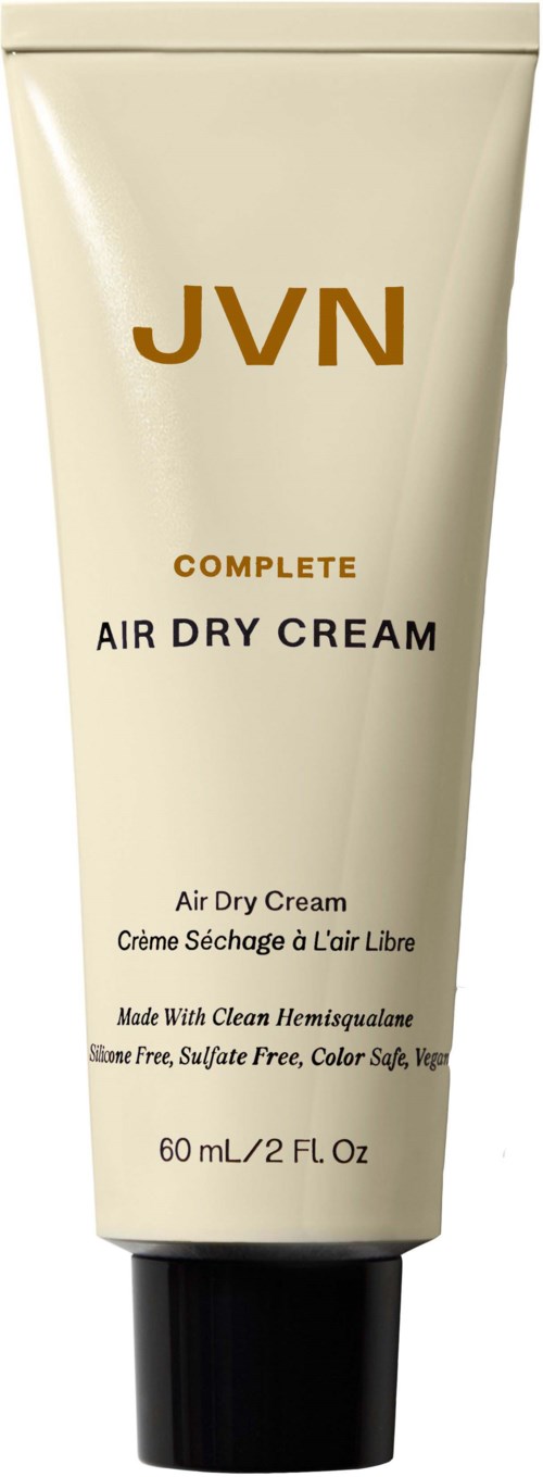 Eine Tube JVN Complete Air Dry Cream für Haare, in Weiß mit Gold- und schwarzem Text, enthält 60 ml.