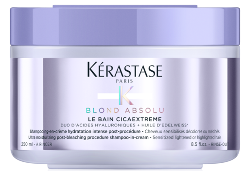 Et krukke med Kerastase Blond Absolu hårpleieprodukt med lilla lokk og hvit etikett.