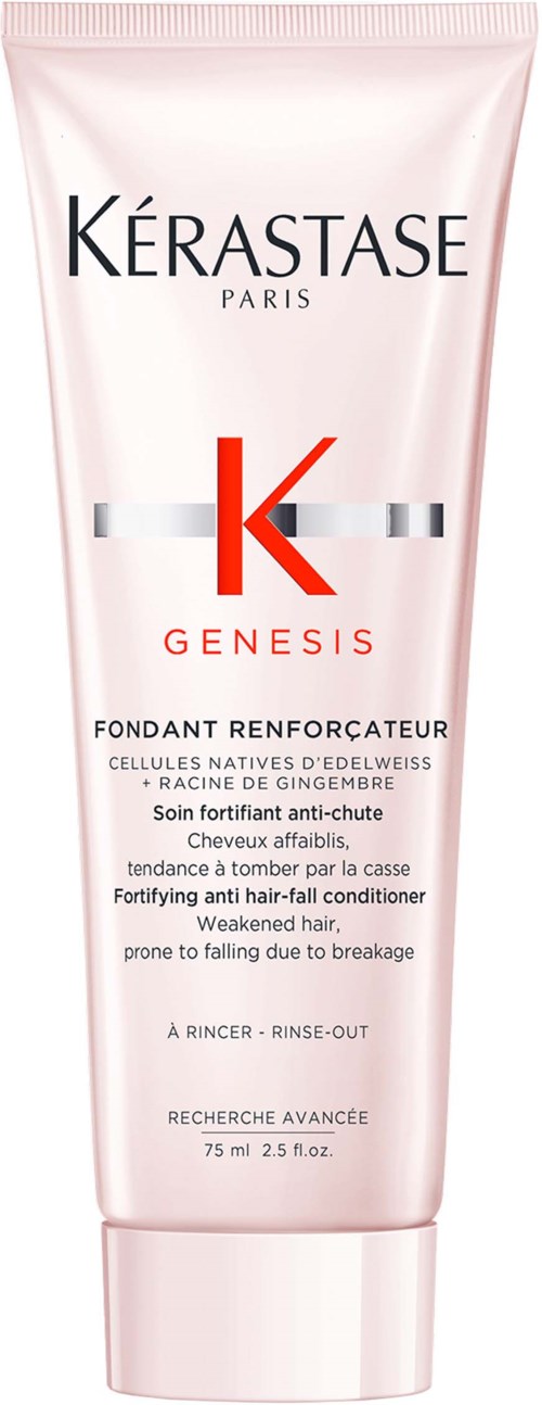 A pink tube of Kérastase Genesis hair conditioner with black and red text detailing its benefits.