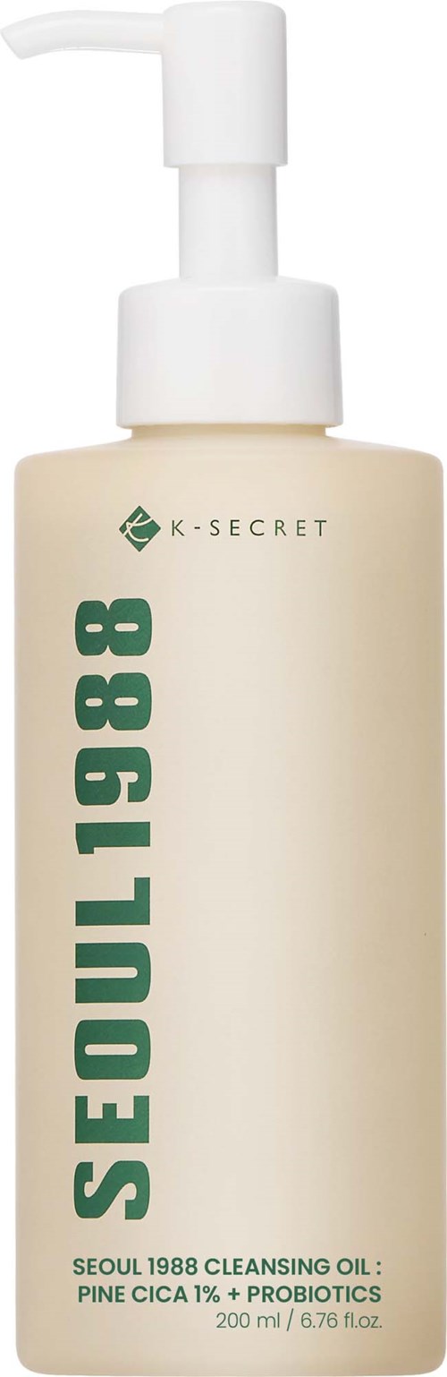 A bottle of cleansing oil with a pump, labeled Seoul 1988, contains pine cica and probiotics. Simple design.