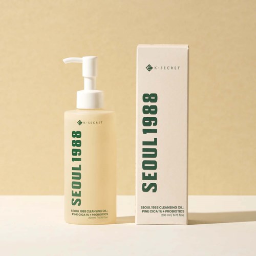 A bottle of cleansing oil with pump and its box, both labeled 'Seoul 1988' and containing 200 ml.