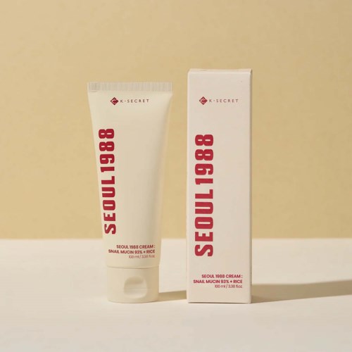 A tube of Seoul 1988 cream and its white box with red text on a beige background.