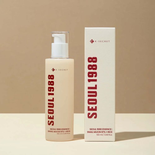 A skincare bottle and box labeled with 'Seoul 1988' and 'K-Secret' on a beige background.