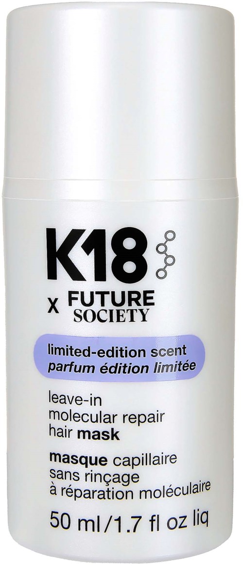 A white spray bottle labeled K18 FUTURE SOCIETY with details about a leave-in hair repair mask, 50 ml.