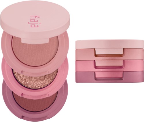 Ein Set pinker Kosmetikbehälter, einschließlich einer runden Dose mit Make-up und drei gestapelten rechteckigen Dosen.