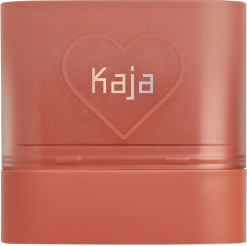 A pink container with a heart and the word "Kaja" inside it.