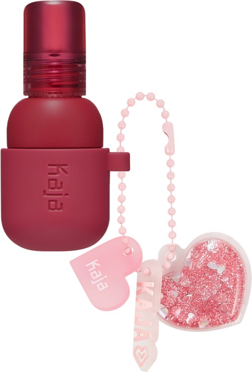 Eine pinke Flasche mit Deckel und einem herzförmigen Schlüsselanhänger, klein und hübsch, mit "BEY" geprägt.