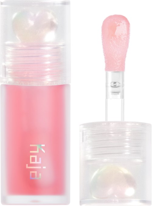 Lip gloss container with pink gloss and a small applicator brush inside.