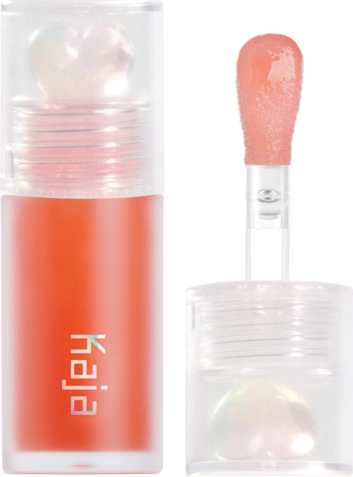 Lippenbalsemhouder met roze glans en kleine applicatiekwast.