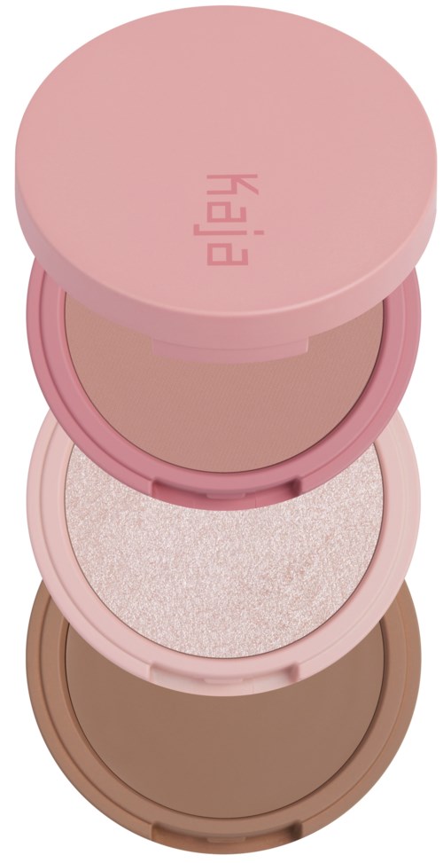 Gestapelde ronde make-uppotten in roze, beige en bruin met deksels. De bovenste deksel heeft de tekst 'Hey!'.