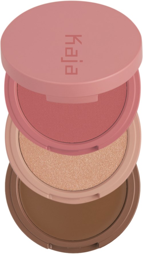 Gestapelde blush- of oogschaduwverpakkingen in roze, beige en bruin met een roze deksel bovenaan.
