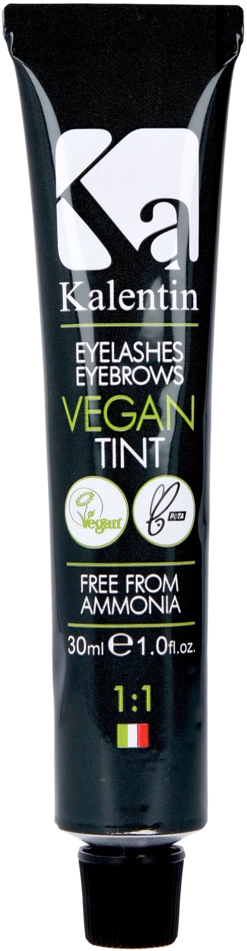 A black tube with white, green, and gray text for vegan eyebrow tint. It mentions it is free from ammonia.