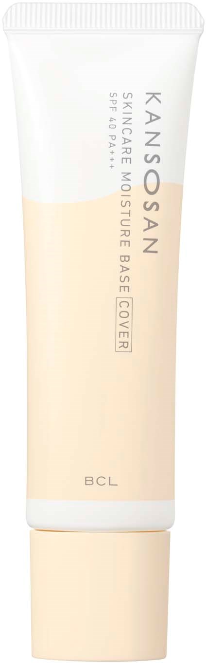 Een witte tube met label Kanosan, huidverzorging vochtbasis, met beige en witte tekst.