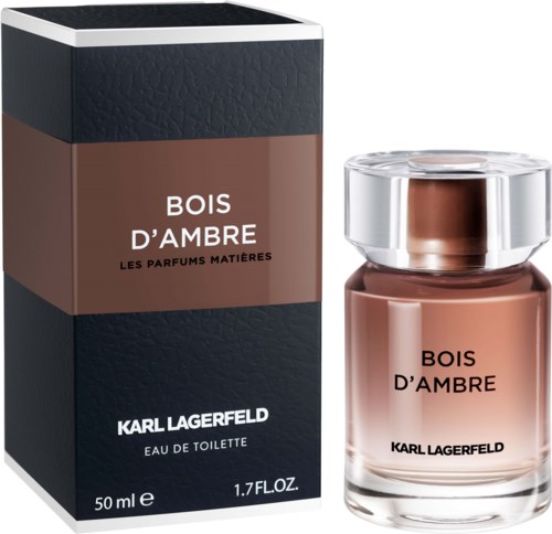 Ein Parfümflasche und eine Schachtel mit braunen und schwarzen Farben, beschriftet 'Bois d'Ambre' von Karl Lagerfeld.