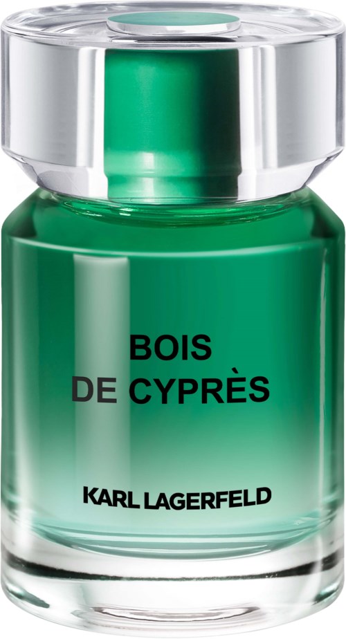 Eine grüne Parfümflasche mit silberner Kappe, beschriftet 'Bois de Cyprès' von Karl Lagerfeld.