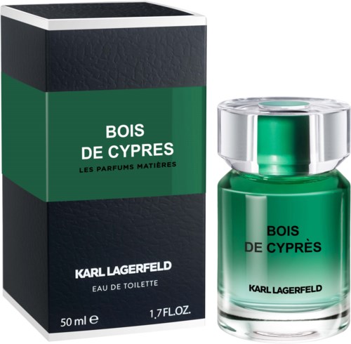 Ein Parfümflasche und Box in Grün und Schwarz, beschriftet 'Bois de Cypres' von Karl Lagerfeld.