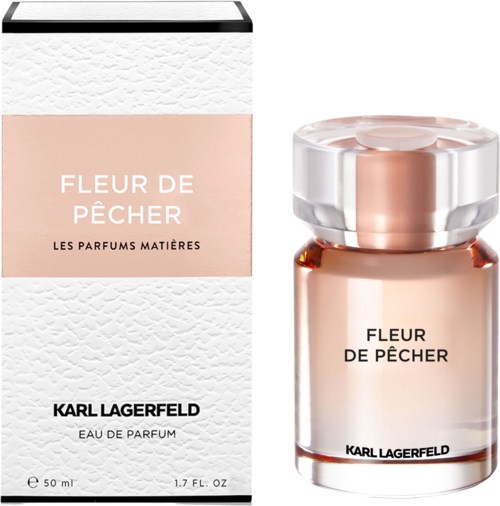 Ein Parfümflasche und ihre Verpackung, beide namens Fleur de Pêcher, in sanften Rosa- und Weißtönen mit einfachem Text.