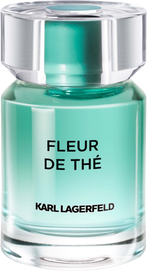 Eine grüne Parfümflasche namens Fleur de Thé von Karl Lagerfeld mit einem silbernen Deckel.