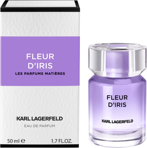Eine lilafarbene Parfümflasche mit silberner Kappe neben einer weißen und lila Box. Die Box und Flasche haben denselben Text.