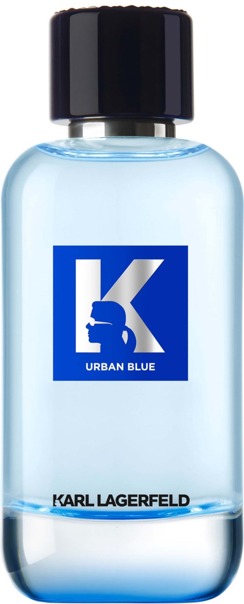 Lähikuva kirkkaasta sinisestä pullosta, jossa on musta kansi ja sininen logo K ja sanat "Urban Blue".