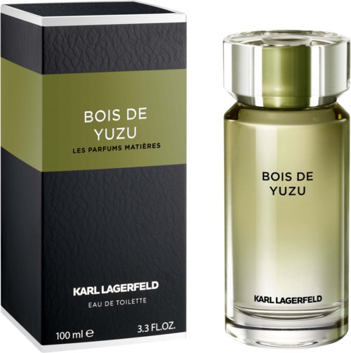 Ein Parfümflasche und Box mit 'Bois de Yuzu' von Karl Lagerfeld, elegantes Design in Schwarz und Grün.