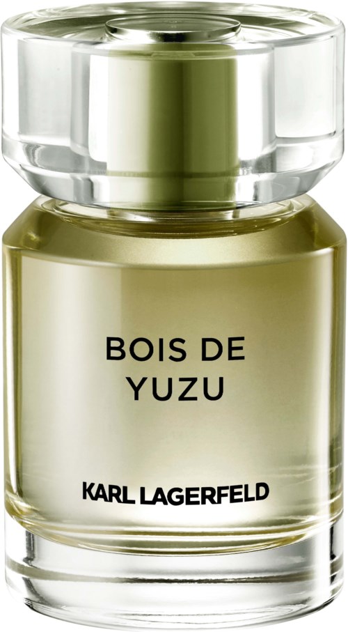 Ein Parfümflasche mit der Aufschrift 'Bois de Yuzu' von Karl Lagerfeld, aus klarem Glas mit hellgrüner Flüssigkeit.