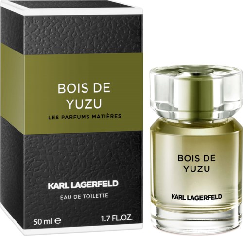 Eine schwarze und grüne Schachtel mit weißen und gelben Text, einschließlich eines Parfümflaschen mit der Aufschrift 'Bois de Yuzu' von Karl Lagerfeld.